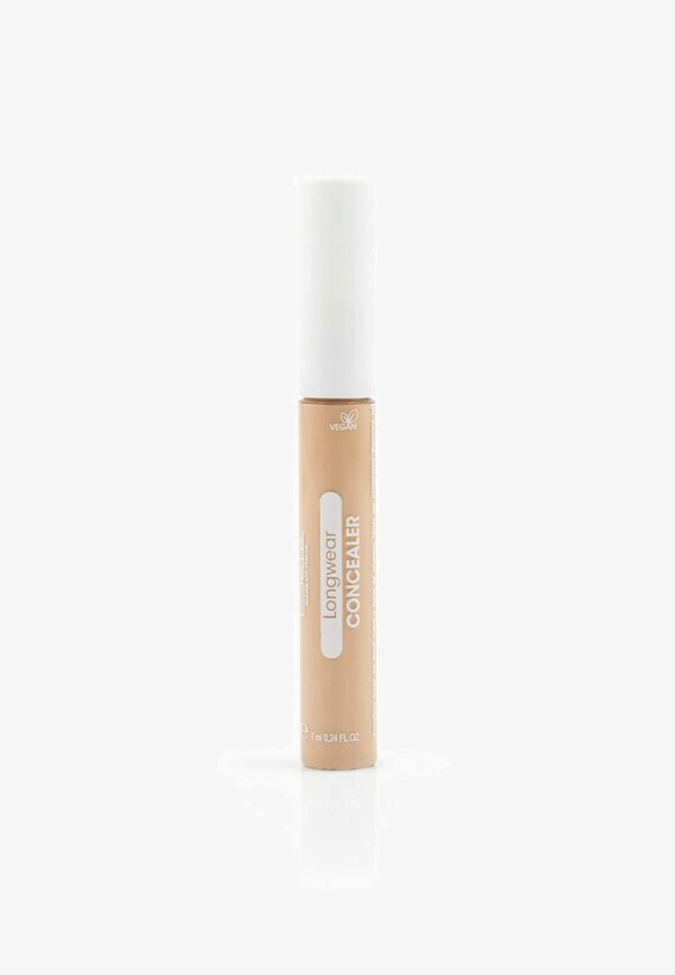 Correttore a lunga tenuta in un tubo di plastica con un cappuccio bianco. Colore beige con un'etichetta semplice in bianco. Design elegante e cilindrico. 7 ml.
