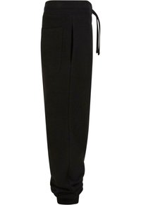 Pantalons de jogging noirs en tissu doux, avec une taille à cordon de serrage, des poches latérales, des jambes fuselées et des poignets côtelés.