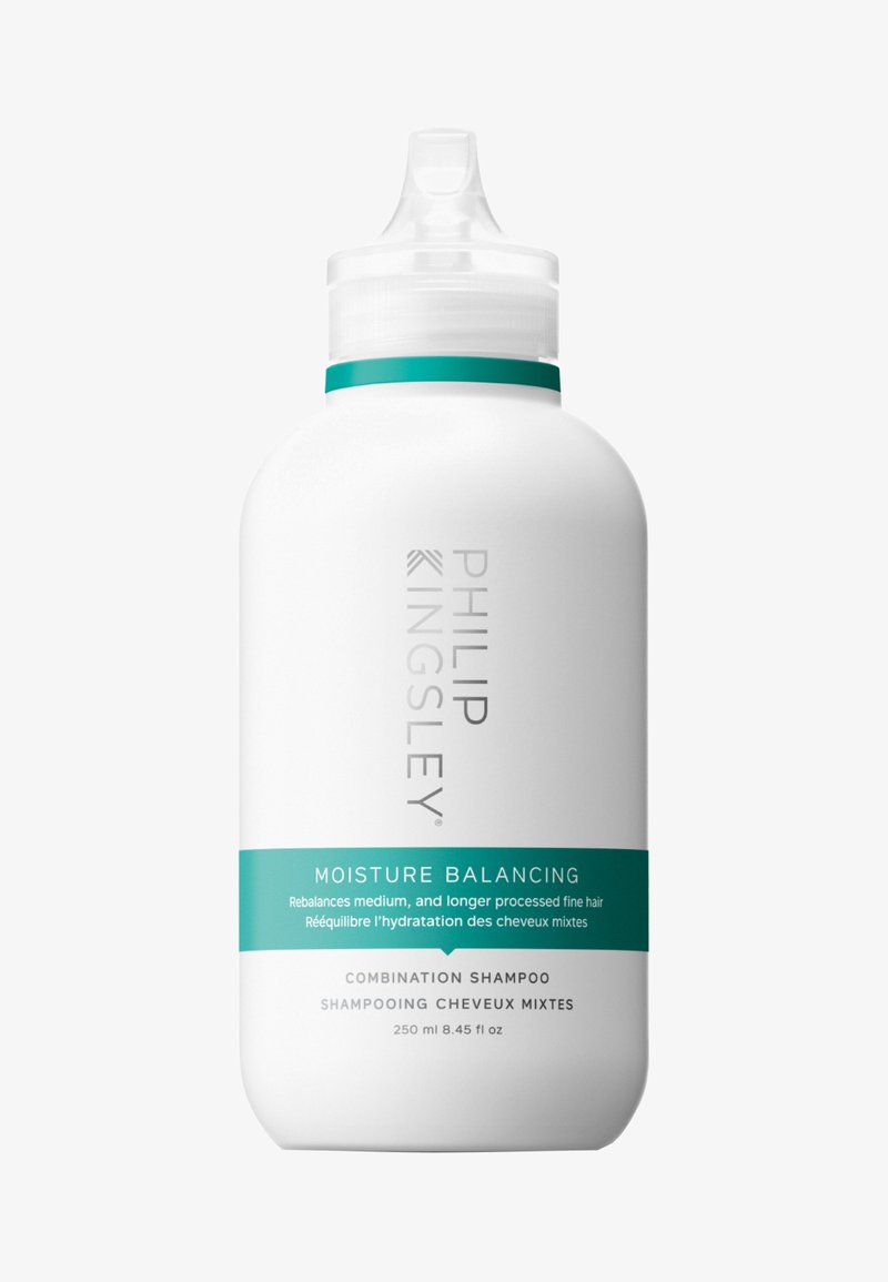 Bottiglia di plastica bianca per shampoo con una parte superiore affusolata. Fascia e etichetta turchesi, con la dicitura "Equilibrio Idratante" e dettagli del prodotto. 250 ml.