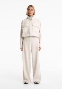 OYSHO PIQUÉ WITH COTTON AND POCKETS - Giacca leggera - sand