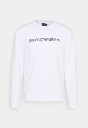 White long-sleeve sweatshirt made of soft fabric, featuring the "Emporio Armani" logo in dark gray across the chest. Simple design, crew neck.
