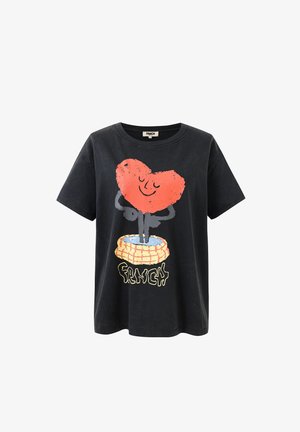 Black T-shirt with a smiling red heart character standing in a yellow and blue nest, with "FRNCH" text below the design.
