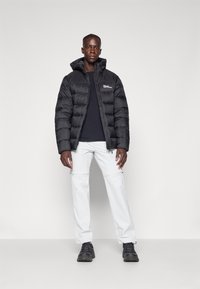 Jack Wolfskin NEBELHORN  - Down jacket - black
