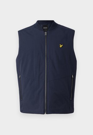 Tamsiai mėlynas be rankovių liemenėlis su lygiu paviršiumi, turintis priekinį užtrauktuką ir mažą geltoną išsiuvinėtą logotipą ant krūtinės. Du šoniniai kišeniai.