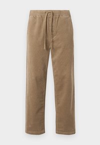 Brown corduroy pants with an elastic waistband and drawstring, featuring a relaxed fit and straight legs, textured surface with ribbed pattern.
