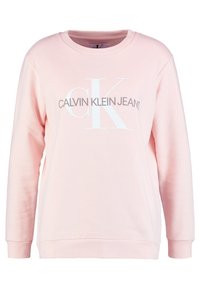 Světle růžová mikina s dlouhými rukávy, kulatým výstřihem a gumovým potiskem „CALVIN KLEIN JEANS“ v šedé a bílé barvě. Měkká textura, ležérní design.