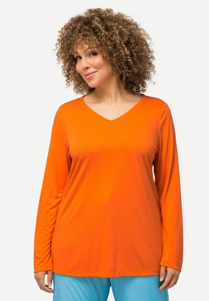 Langsleeve V-hals top in feloranje, gemaakt van gladde, lichte stof. Kenmerkt een relaxed fit en een afgeronde zoom.