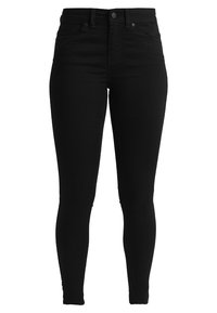 Jeans skinny negros de talle alto hechos de mezclilla, que cuentan con un diseño clásico de cinco bolsillos y cierre frontal con cremallera y botón.