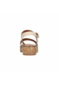 Kurk platform sandalen met een beige leren bovenwerk, met een gebogen bandontwerp en een verstelbare gesp. Geprofileerde hak voor extra stabiliteit.