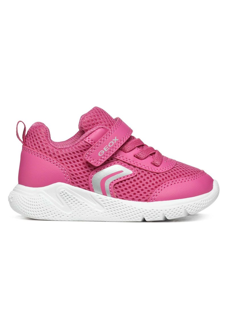 Bright pink children's sneaker with white sole, mesh upper, Velcro strap labeled "GEOX," and silver chevron side detail.