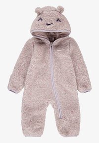Ružičasta in smetana puhasta flis pajac z medvedkasti uši, sprednje zadrgo in Nike logo. Ima teksturirano tkanino in rebraste manšete.
