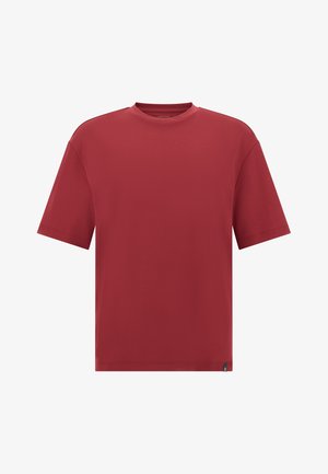 Küsimatu punane lühikeste varrukatega T-särk, mis on valmistatud kerge puuvilla segu. Ümmargune kaelus, mugav lõige ja väike brändi label vasakus alumises servas.