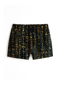 Čierne plavky s kultovými zlatými hieroglyfickými vzormi, so sťahovacím pásom a jemnou textúrou. Vhodné na vodné aktivity a voľný čas.