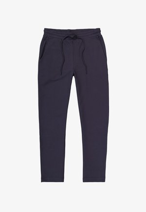 Navyblaue Jogginghose aus weichem Stoff, mit einem Zugbandbund, zwei seitlichen Taschen und schmal zulaufenden Beinen für eine taillierte Passform.