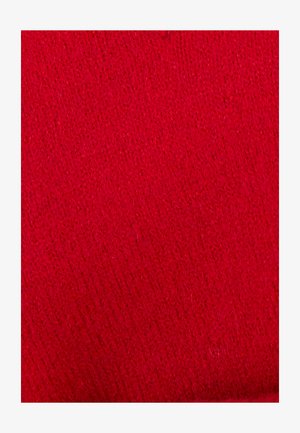 Tissu tricoté rouge avec une surface texturée, un tissage serré et des fibres visibles, mettant en valeur une teinte riche et vibrante.
