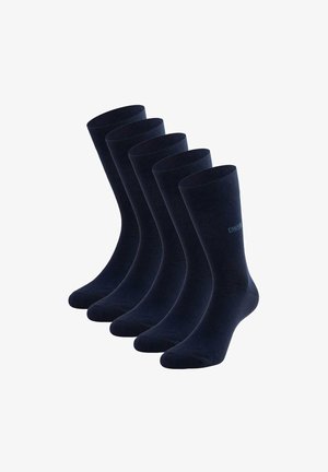 Fünf Paar dunkelblaue Socken aus weichem Baumwollmischgewebe, mit einem gerippten Bündchen und dezenten Logodetails an der Seite.