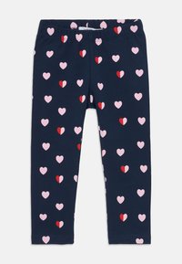 Navy Leggings aus weichem Stoff mit elastischem Bund, versehen mit einem sich wiederholenden Muster aus pinken und roten Herzen.