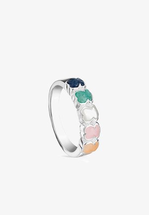 Bague en argent ornée de six pierres en forme de trèfle : bleu marine, vert, blanc, rose et orange. Surface lisse, finition polie, détails complexes.