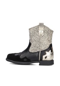 Black leather ankle boot with a silver and spotted white upper, featuring cut-out designs and a pull tab at the back for easy wear.