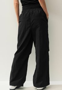 Next TRACK BOXER TALL  - Tygbyxor - black