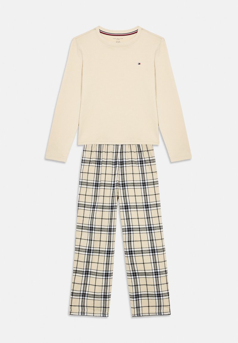 Cream long-sleeve top with small logo paired with beige, black, and white plaid elastic-waist pants laid flat on white background.