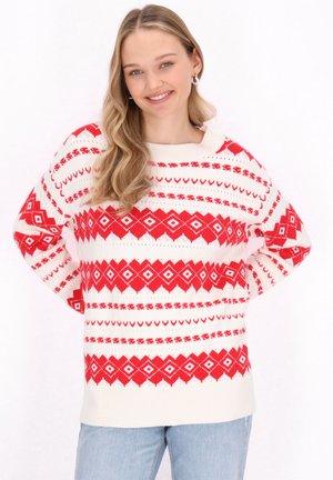 Rot-weißer Pullover mit Muster, der ein geometrisches Design mit Rauten und Herzen zeigt, aus einem weichen Strickmaterial gefertigt, mit einem gerippten Ausschnitt.