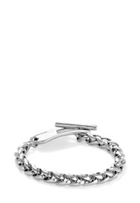 Bracelet en chaîne en argent présentant des maillons entrelacés, finition polie et fermoir à bascule pour une fermeture sécurisée. Design simple et durable.