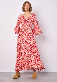 Apricot IKAT SWIRLS - Maxikleid - red