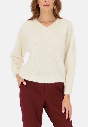 - Sweter