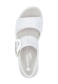 White slide sandal with perforated upper, adjustable strap with metallic buckle, soft gray insole, and cushioning for comfort.