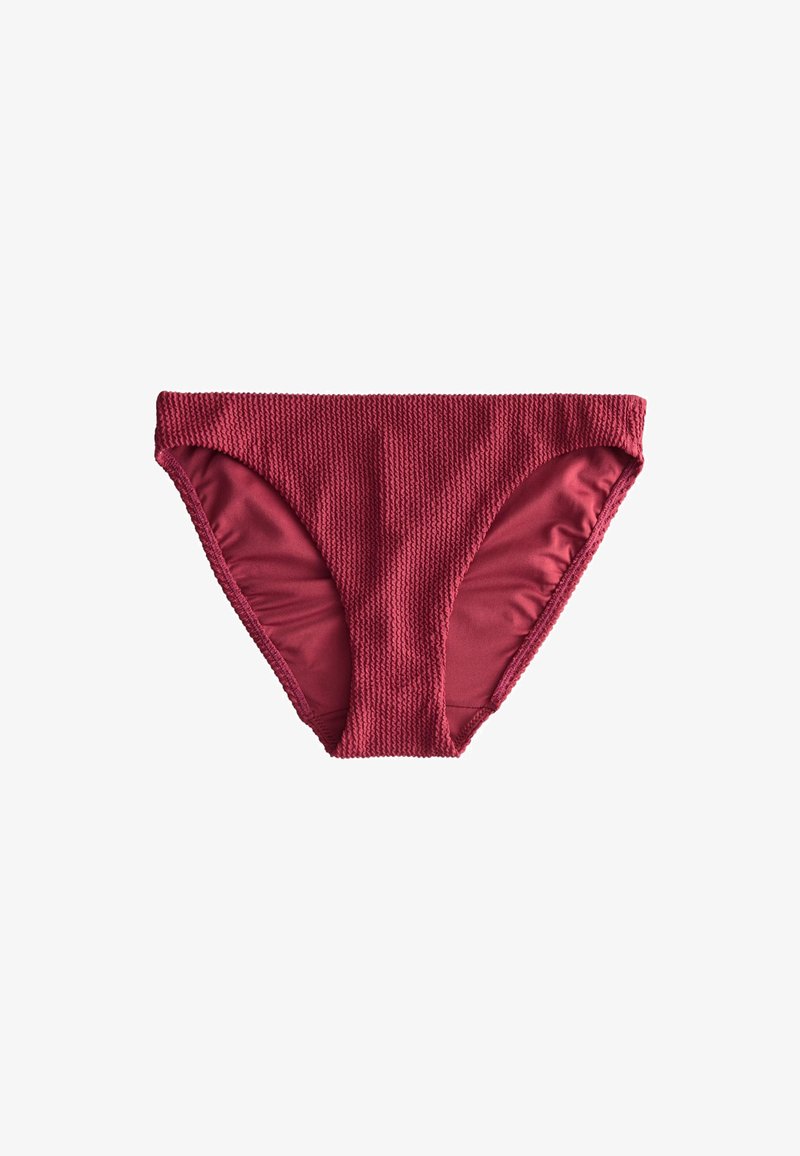 Bas de bikini rouge texturé avec doublure intérieure lisse, présenté à plat sur fond blanc.