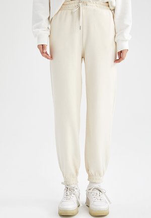 REGULAR FIT - Pantaloni sportivi - beige