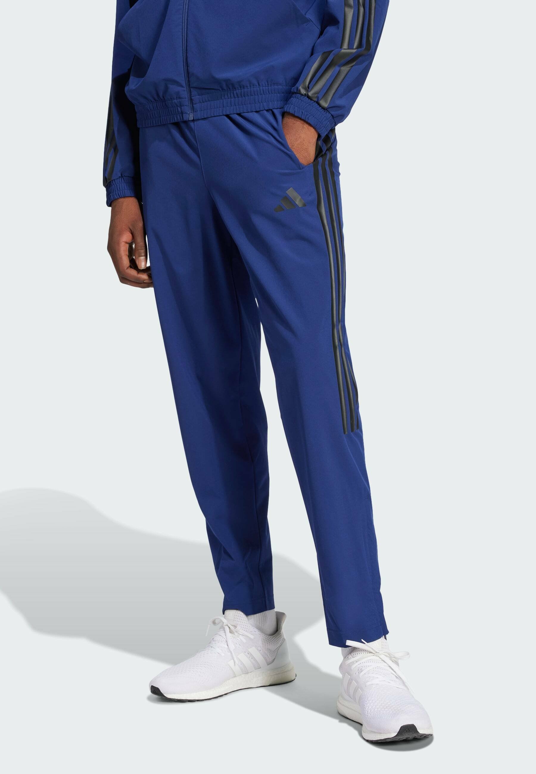 black and blue adidas pants