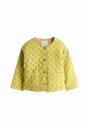 Gul quiltet jakke med lille blomstermønster, rund halsudskæring, træknapper, to forlommer og stribet kantdetalje.