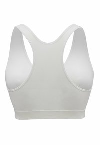 Weißer Sport-BH aus strukturiertem Material, mit breiten Trägern und nahtlosem Design. Der Rücken verfügt über einen Racerback-Ausschnitt für optimale Bewegungsfreiheit.