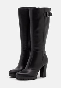 Black leather knee-high boots with a tall block heel, featuring a side buckle detail and a smooth finish. Sole has a treaded pattern.