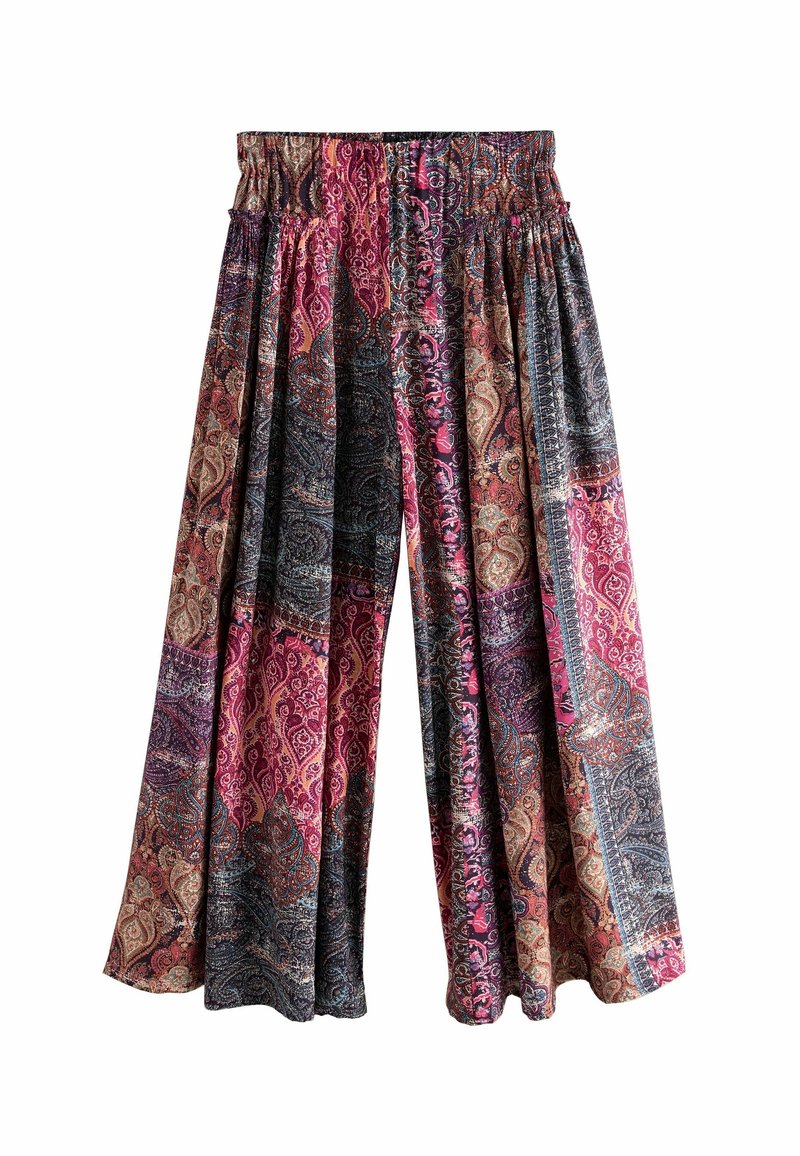 Pantalon à jambes larges avec taille élastique froncée, présentant un motif cachemire multicolore dans des tons de rose, noir et beige.