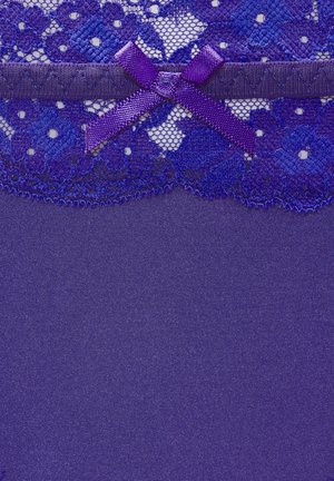 Purple lingerie with a lace top featuring floral patterns, a satin ribbon bow, and smooth fabric below. The lace has intricate detailing.