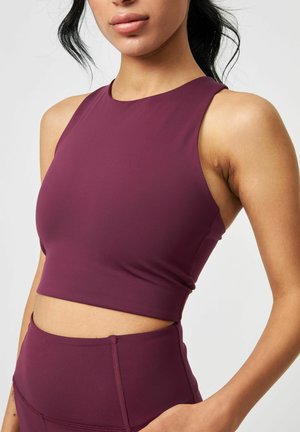 DYLAN - Medium support sports bra - plum
