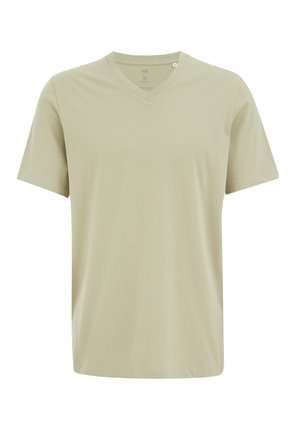 T-shirt court à manches courtes de couleur beige clair en coton. Présente un décolleté en V et une coupe décontractée, texture lisse avec des détails de design minimaux.