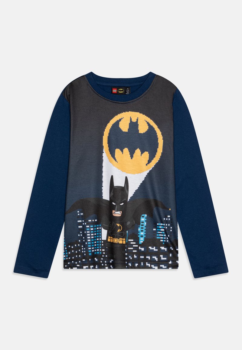 Long-sleeve t-shirt featuring a Batman graphic on a dark background, with blue sleeves, a round neckline, and a soft cotton material.