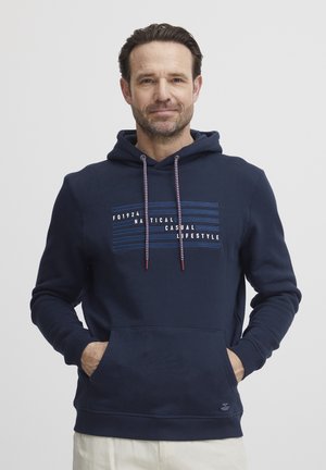 Navy blue hooded sweatshirt with drawstrings, front pocket, and text design. Ribbed cuffs and hem, made from soft cotton material.