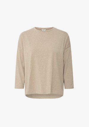 Beige langærmet top lavet af blødt stof. Har en rund halsudskæring og en afslappet pasform med sænket skuldre. Hem er let afrundet.