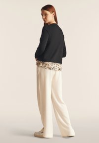 Freddy Camiseta de manga larga - black zebra animalier