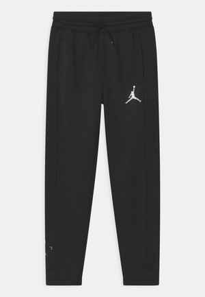 CORE PERFORMANCE THERMA UNISEX - Tracksuit bottoms - black