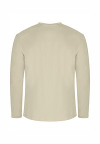 Beige Langarmhemd mit Rundhalsausschnitt, weicher Textur und sauberen Abschlüssen. Nahtlose Schultern und gerader Saum. Einfaches Design ohne Grafiken.