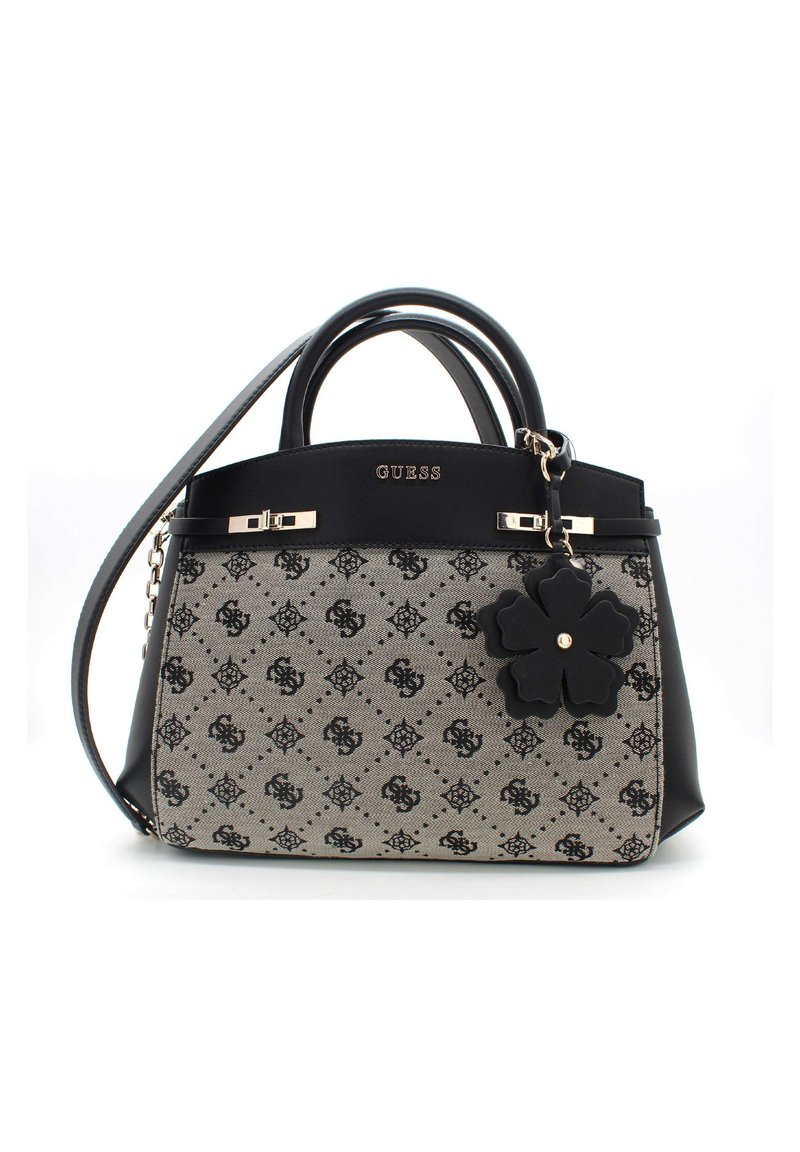 Zwart- en grijsgepatenteerde handtas met dubbele handgrepen en een afneembare riem. Voorzien van hardware in goudkleur en een zwarte bloemvormige bedel als accent.