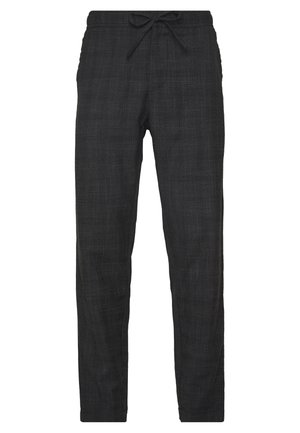Black plaid trousers featuring a drawstring waist, slim fit, and a textured fabric. The pattern consists of subtle grid lines.