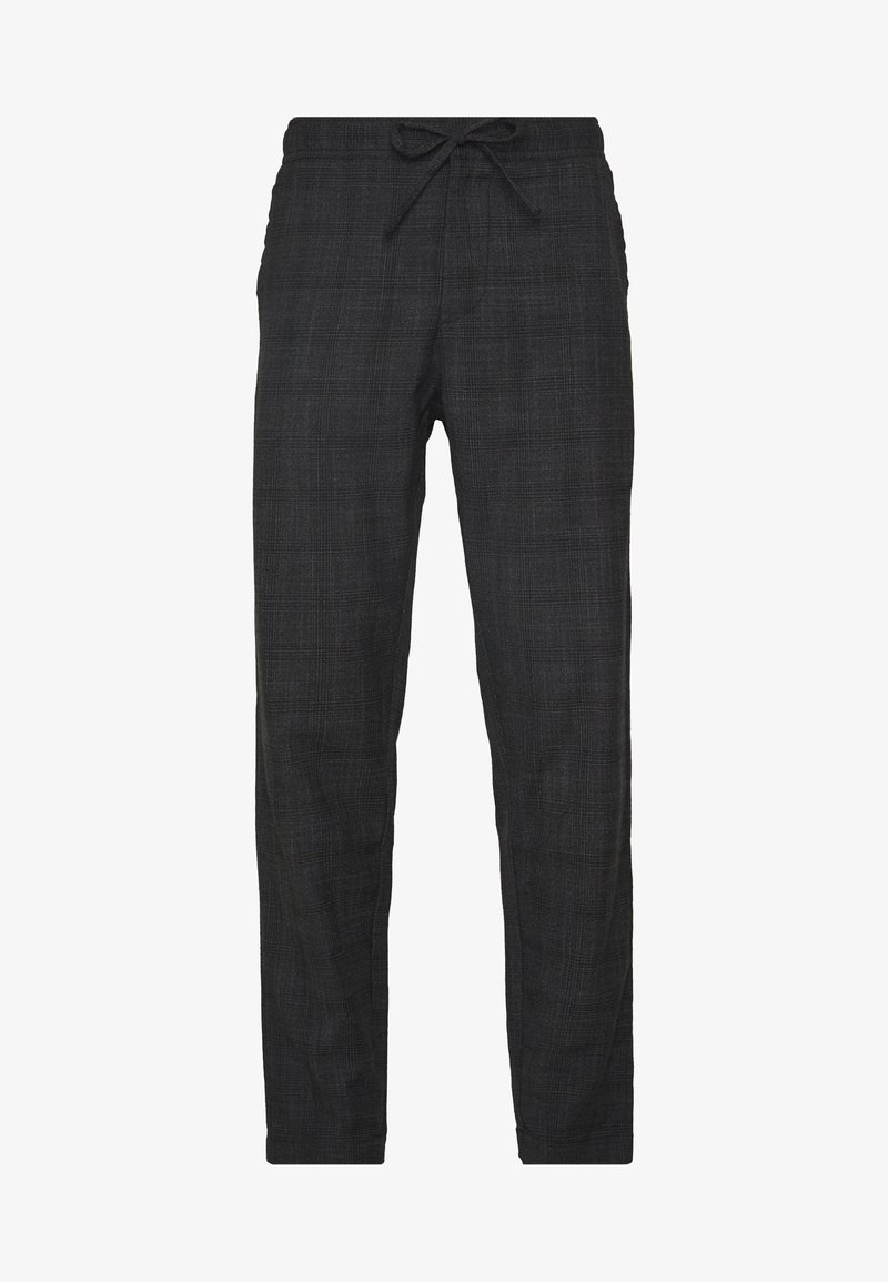 Pantalon à carreaux noirs avec taille à cordon, coupe slim et tissu texturé. Le motif est constitué de fines lignes en quadrillage.