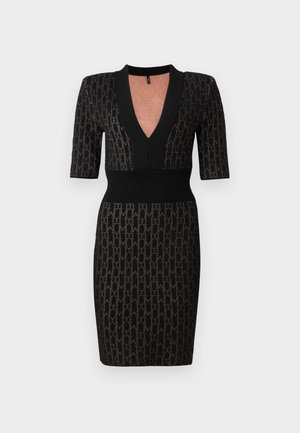 Black knit dress with a deep V-neck, short sleeves, and a fitted bodice. Features a textured pattern and ribbed accents at the neckline and waist.